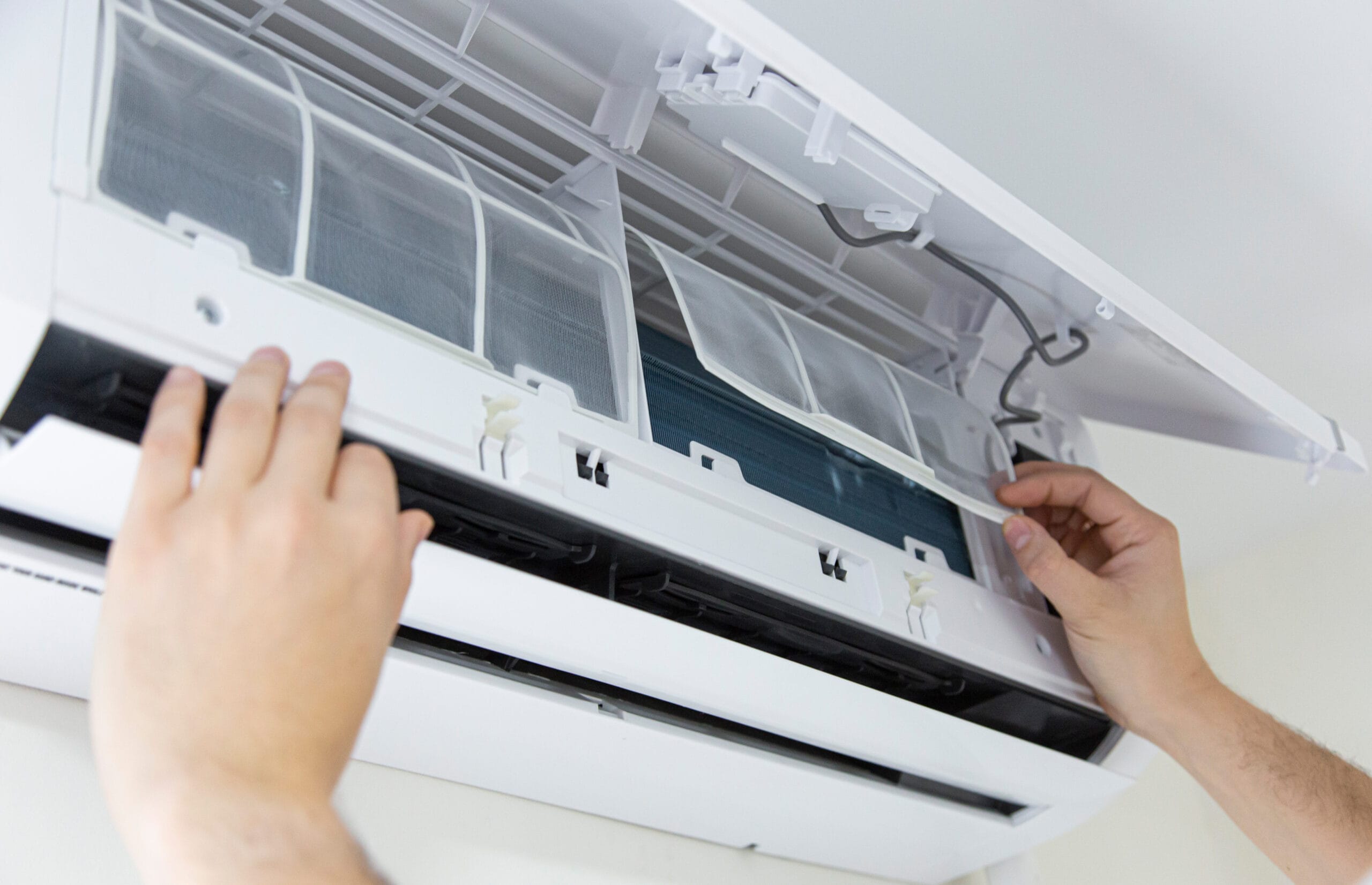 male,technician,cleaning,air,conditioner,indoors.,technician,service,cleaning,the